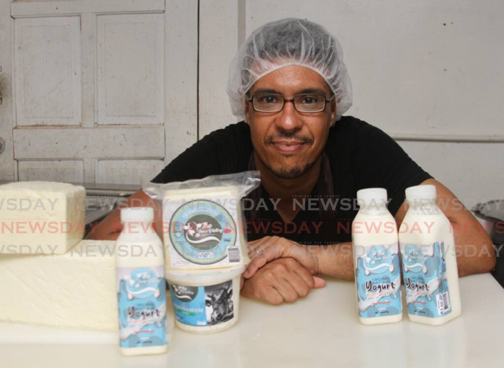  Alex Plaza with the range of cheese, yogurt and creams he producers at his home in Tunapuna.  - Marvin Hamilton