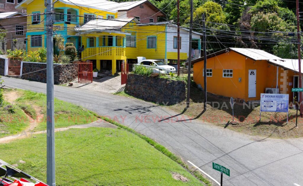 A house on Darrel Spring Road, centre, built on pillars in a similar model to those built by freed African slaves in Tobago.
 - File photo/David Reid