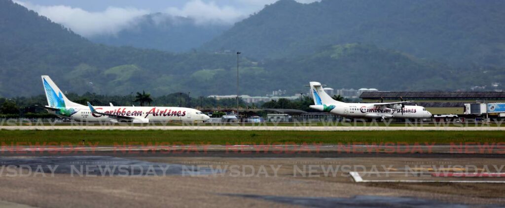 Caribbean Airlines planes at the tarmac at the Piarco International Airport.  File Photo