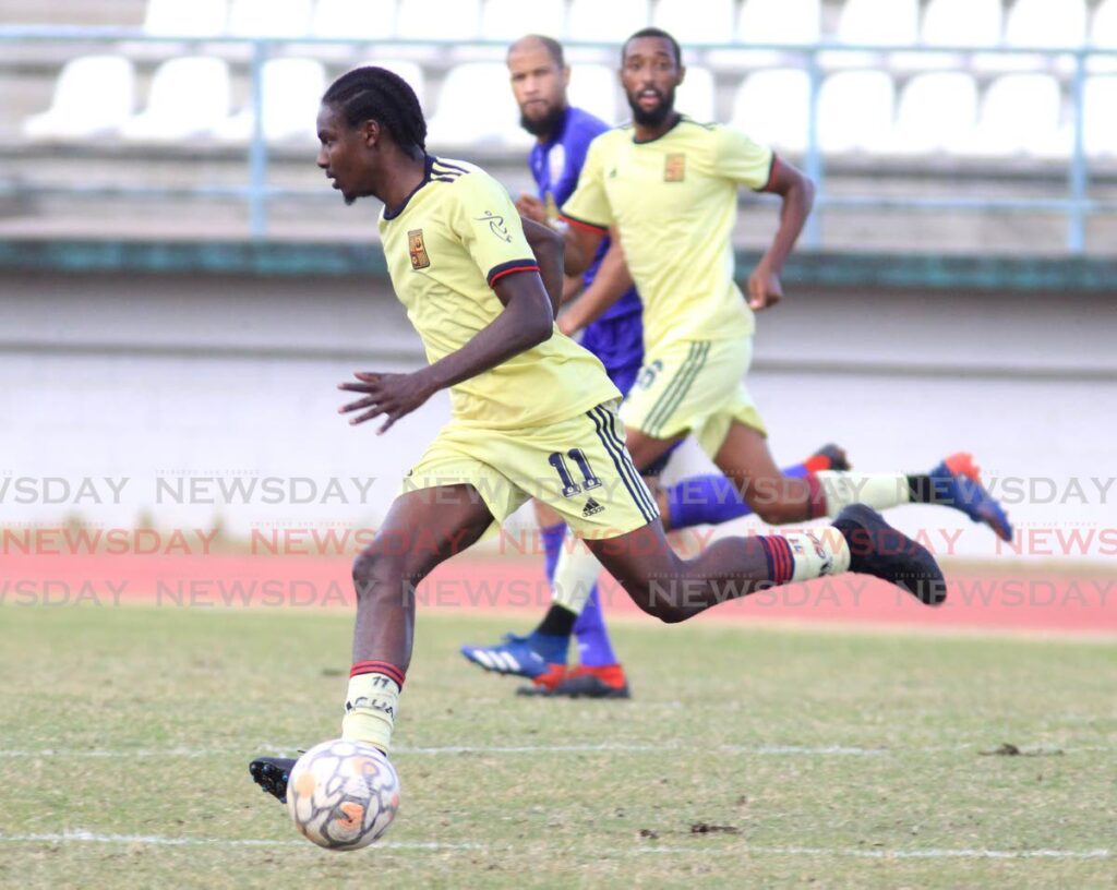 Cunupia FC’s Miguel Williams controls the ball during the TT Premier Football League match against AC Port of Spain, on Saturday, at the Larry Gomes Stadium, Malabar. - Photo by Ayanna Kinsale