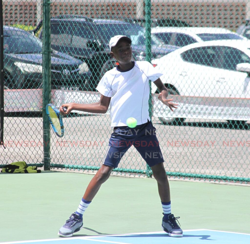 Josiah Hills plays a forehand shot at the Catch National Championships on Monday.  - Angelo Marcelle