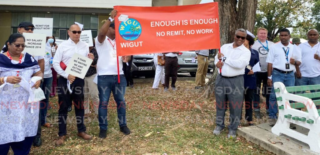 FLASHBACK: WIGUT members protest on March 23 at the UWI, St Augustine campus. UWI students said Monday it was unfair that they must suffer over issues such as stalled wage negotiations which are not their fault. FILE PHOTO - 