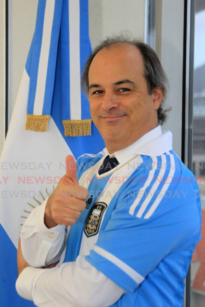 Argentina's Ambassador Marcelo Suarez Salvia with his national team's football jersey during an interview at his office on Marval Road, Port of Spain. - AYANNA KINSALE