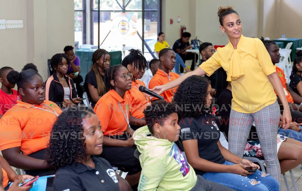 Tower of Power Movement (TOPM) founder Khadija Ali-Samsoul Harris engages students at a youth development workshop at the Bethesda Multi-purpose Facility in Tobago on Tuesday. - Photo by David Reid