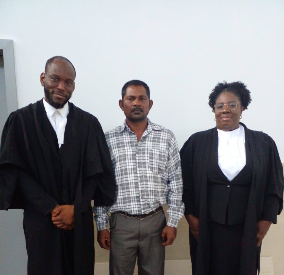 Jagdeo Ramkissoon, centre, with his public defenders Darryl Douglas and Chimere Gibson-Wadi, after he was acquitted on Wednesday. - 