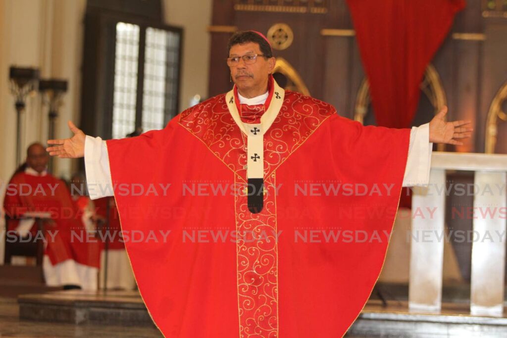 MAIN PHOTO ON PAGE 7

JASON'S PASSION: Archbishop of Port of Spain Jason Gordon speaks during Good Friday Mass at the Cathedral of the Immaculate Conception in Port of Spain. PHOTO BY ANGELO MARCELLE - 