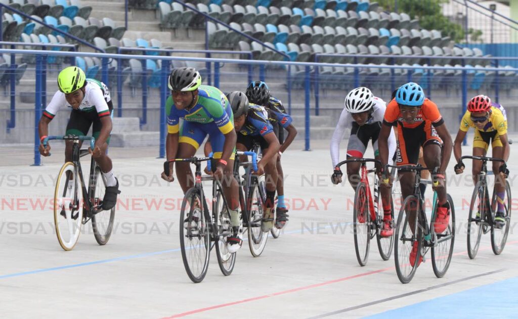 Tinymites boys compete at the Easter Cycling Grand Prix, Skinner Park, San Fernando, Saturday. - ANGELO MARCELLE