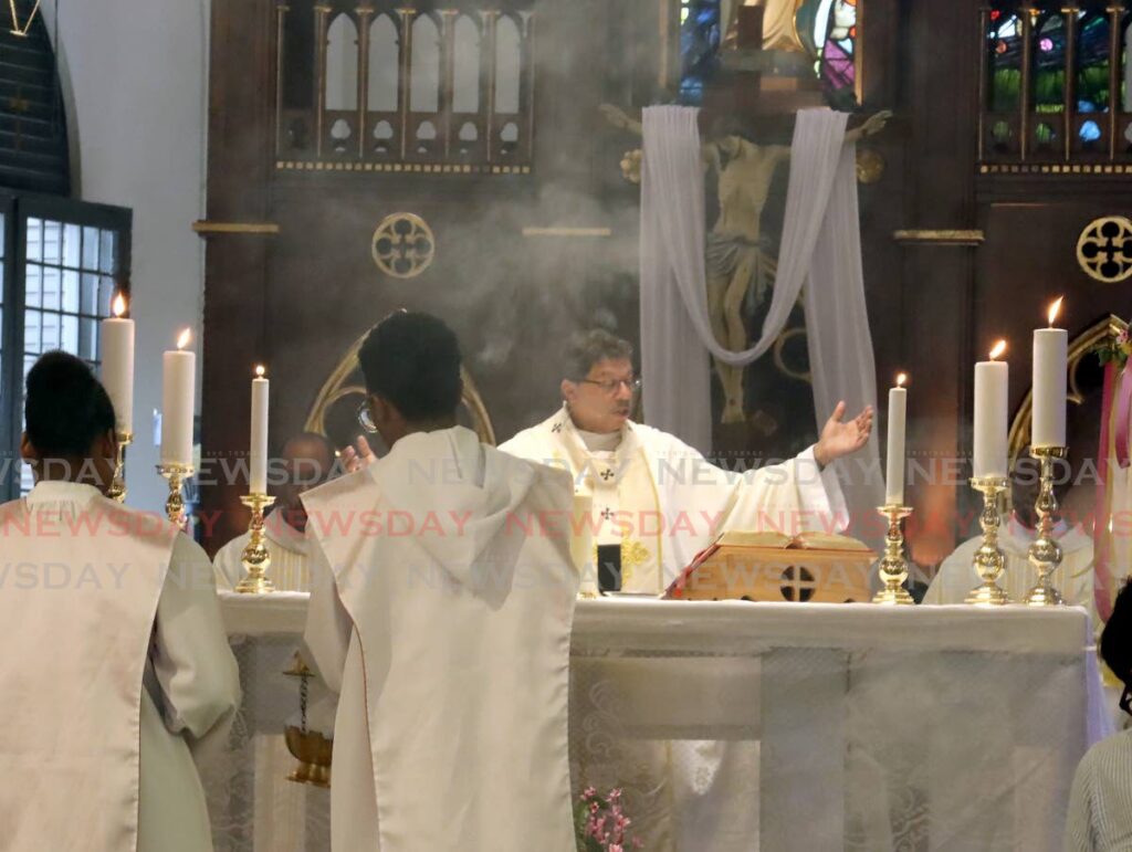 Catholic Archbishop Jason Gordon officiates over Easter Sunday Mass at the Cathedral of the Immaculate Conception, Port of Spain. - ROGER JACOB