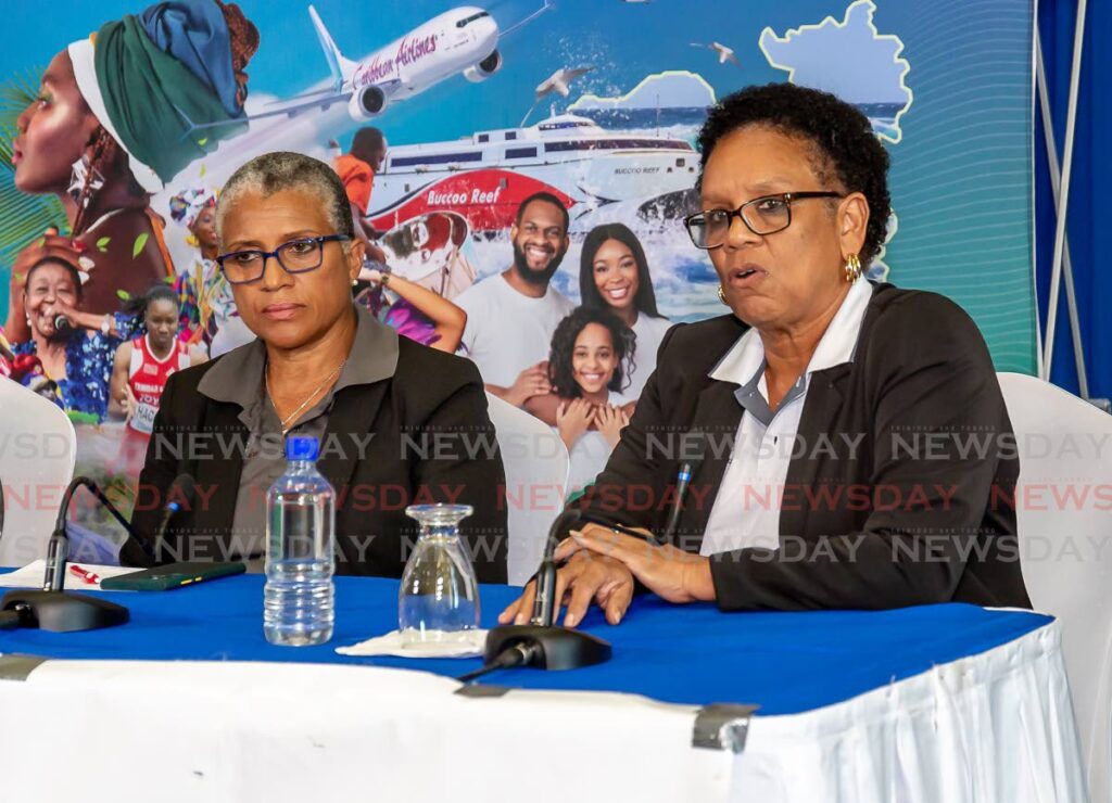 TT Olympic Committee general secretary Annette Knott speaks at a news conference on Thursday  hosted by the TTOC’s local organising committee for the Commonwealth Youth Games 2023 at the Shaw Park Cultural Complex, Tobago. At left, TTOC president Dianne Henderson looks on.   - David Reid