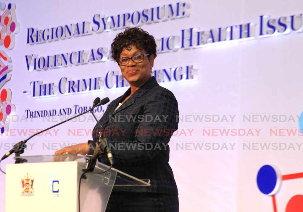 CRIME TALKS: Police Commissioner Erla Harewood-Christopher smiles while speaking on Monday at the Caricom crime symposium at the Hyatt Regency in Port of Spain. PHOTO BY AYANNA KINSALE - 