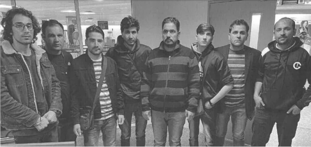 The eight Pakistan men who were refused entry into TT on Monday morning. - 