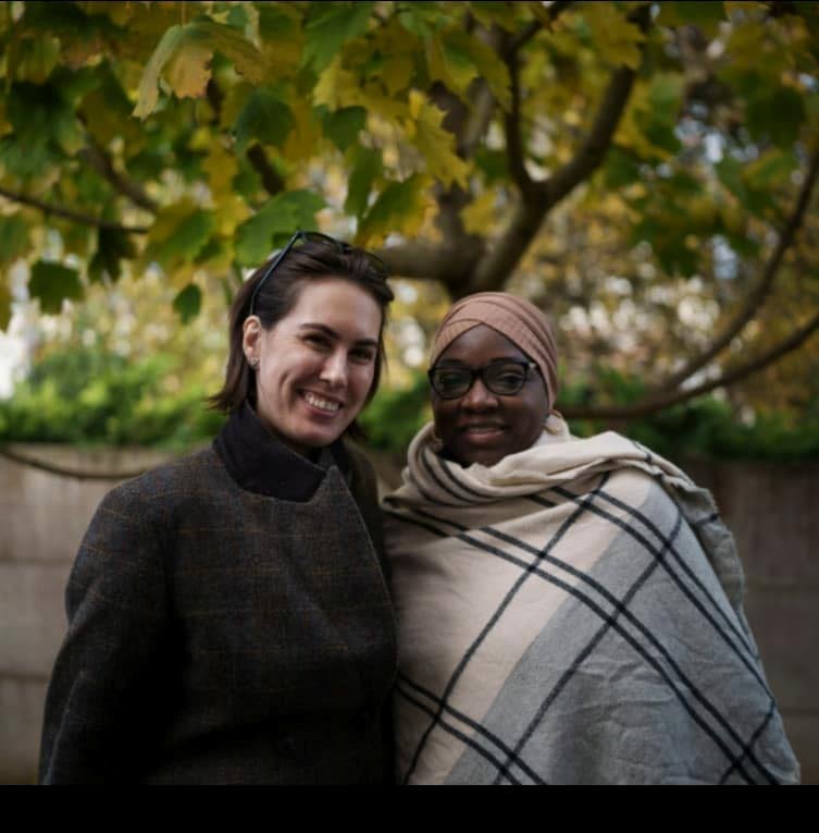 Associated Press (AP) journalist Renata Brito, left and Mayemouna Sow the aunt of Malian migrant Alassane Sow. 