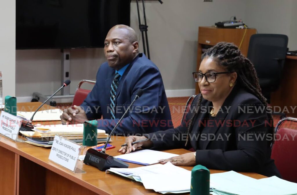 Director of Public Prosecutions Roger Gaspard and deputy director Joan Honore-Paul at the Joint Select Committee for National Security on the criminal justice system held at the Linda Baboolal Conference Room, Office of the TT Parliament, Port of Spain, on Wednesday. - ROGER JACOB