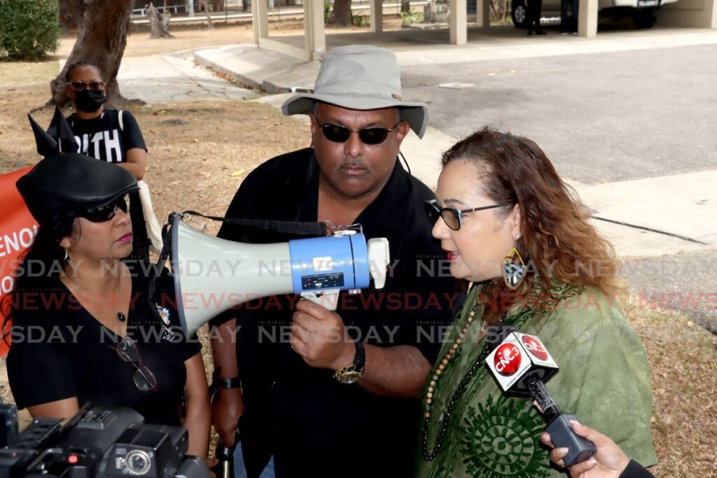 WIGUT president Dr Indira Rampersad, left, and other members listen as UWI principal Rose-Marie Belle Antoine address them during a protest at the St Augustine campus on April 20.File phot by Roger Jacob