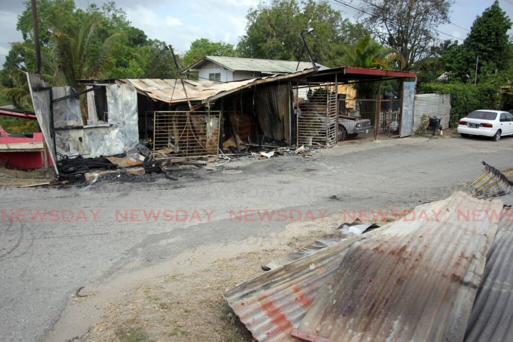 Fire destroyed a shop  at #1 Railway Reserve, Tramline Road, Princes Town, on Thursday morning - Lincoln Holder