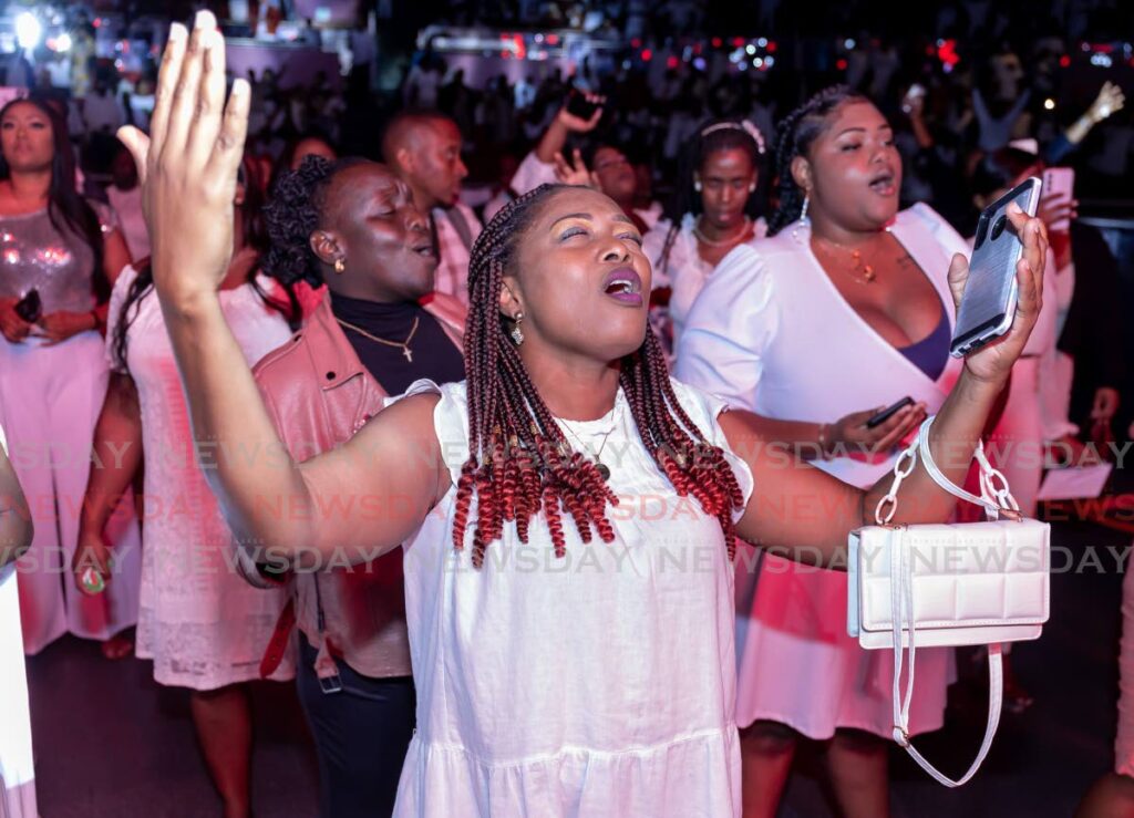 Patrons worship during gospel night at the Tobago Jazz Festival, Shaw Park Complex, on Thursday. - David Reid