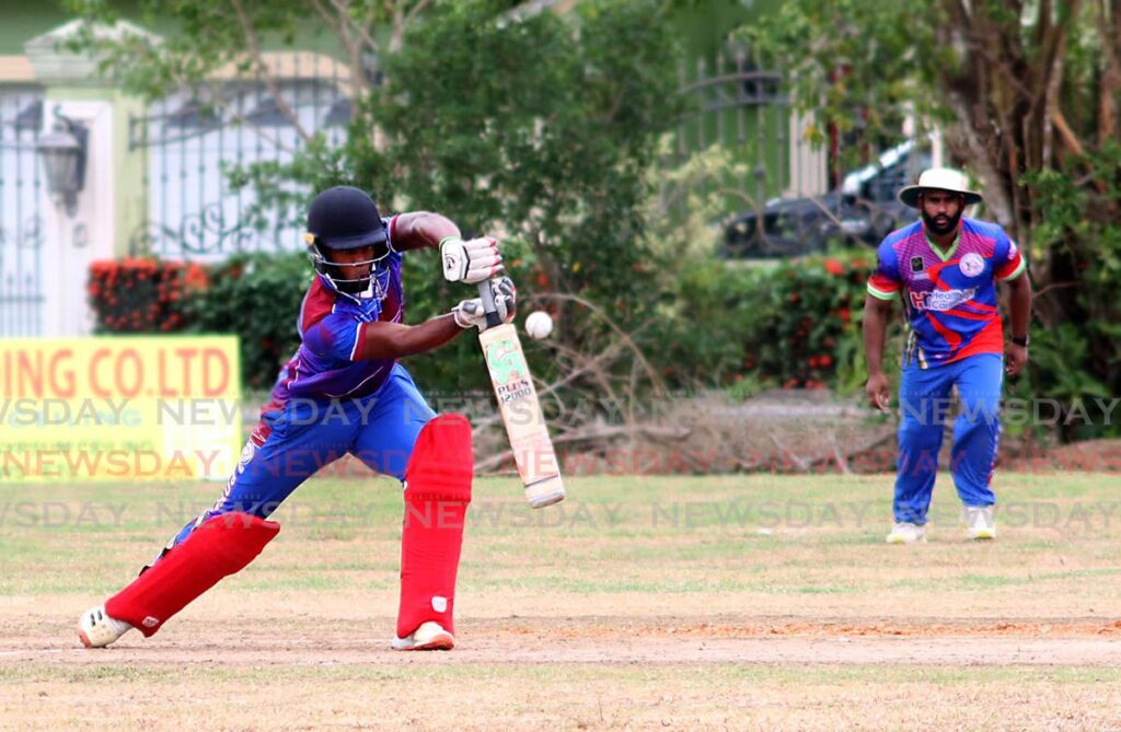 Powergen batsman Ewart Nicholson plays a shot in the TTCB 50-over competition against Comets at Pierre Road Recreation Grounds, Charlieville, Sunday. - Roger Jacob