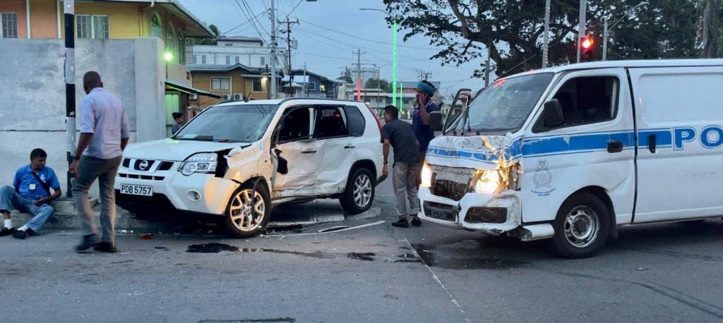 The marked police van and the SUV which were involved in Friday's accident on Independence Avenue, San Fernando. - 