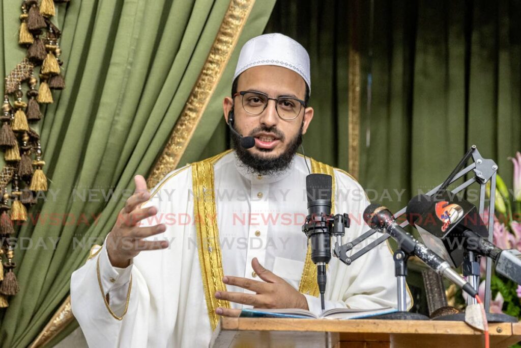 Imam Maulana Atif Majeed Sulaimani give his Eid Ul Fitr sermon at the San Fernando Jama Masjid on Saturday. - JEFF K MAYERS