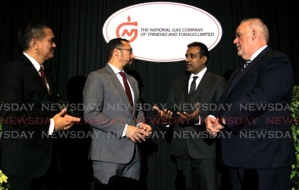 NGC president NGC Mark Loquan, Energy and Energy Industries Minister Stuart Young, NGC assistant manager, sustainability, Mario Singh, and DNV TT Ltd president and country manager Graeme Pirie in discussion during NGC's Asset Integrity Report at Hyatt Regency, Port of Spain, on Tuesday.
 - AYANNA KINSALE