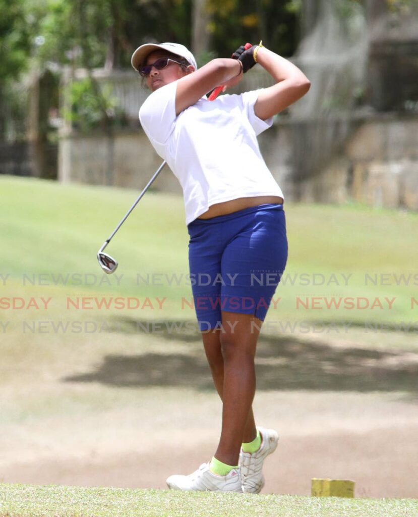 Chloe Ajodha watches her shot at the 2019 Scotiabank Charity Golf Tournament, St Andrew's Golf Course, Moka, Maraval. FILE PHOTO - Angelo Marcelle