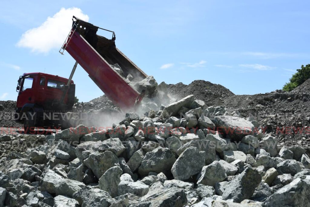 A truck offloads boulders at the Nordberg Crushing Plant at the Studley Park Quarry on Windward Road, Tobago, on November 10, 2020