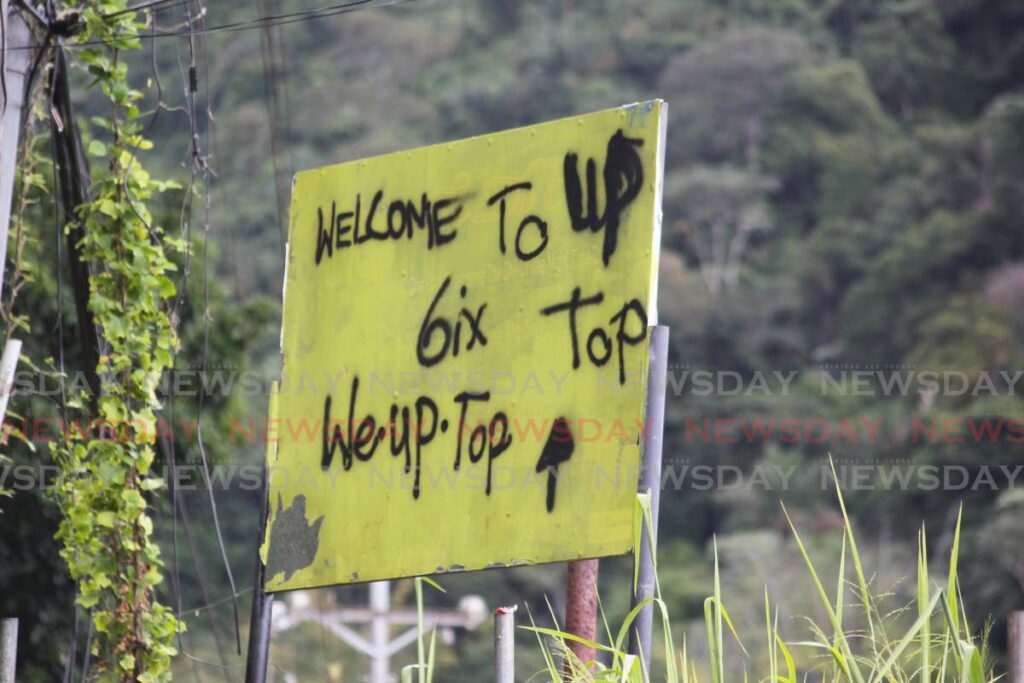 A sign in Upper Dibe Road, St James with the 6 or Sixx gang markings. FILE PHOTO - ROGER JACOB