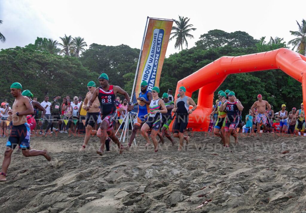 In this file photo, participants compete in the 2022 Rainbw Cup triathlon, held at Turtle Beach, Tobago.  - David Reid