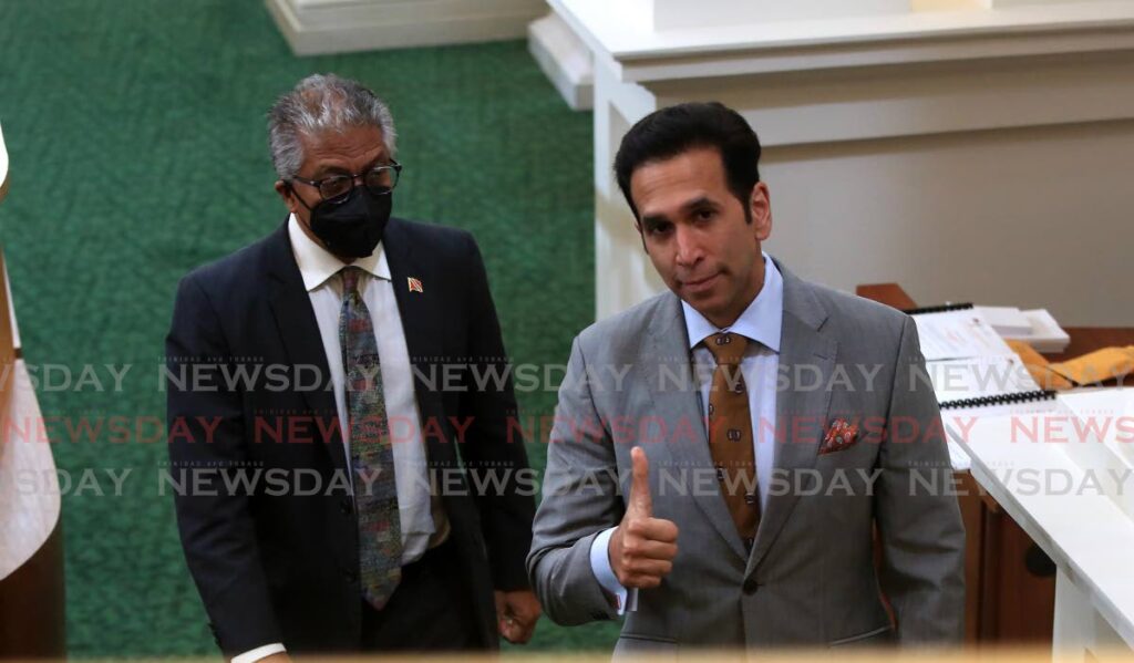 In this file photo, Attorney General Reginald Armour SC and Local Government Minister Faris Al-Rawi greet the media at the Red House.  - 