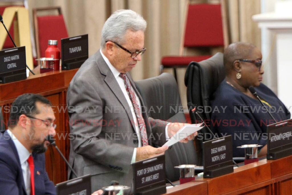 Finance Minister Colm Imbert, centre, addresses Parliament alongside Energy Minister Stuart Young, left, and Housing and Urban Development Minister Camille Robinson-Regis in October 2022. - File photo/Angelo Marcelle