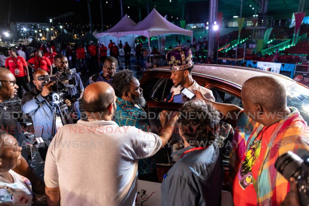 Journalists interview Ta-Zyah O'Connor after his victory at the 2023 Calypso Monarch final, Queen's Park Savannah, Port of Spain on February 20. - Photo by Jeff K Mayers