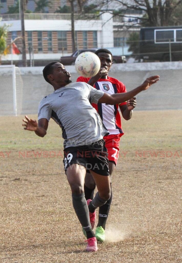 Kadeem Hutchinson of Police FC controls the ball with his chest in a TT Premier Football League match vs Morvant Caledonia, at the Arima Velodrome earlier this season. FILE PHOTO - 