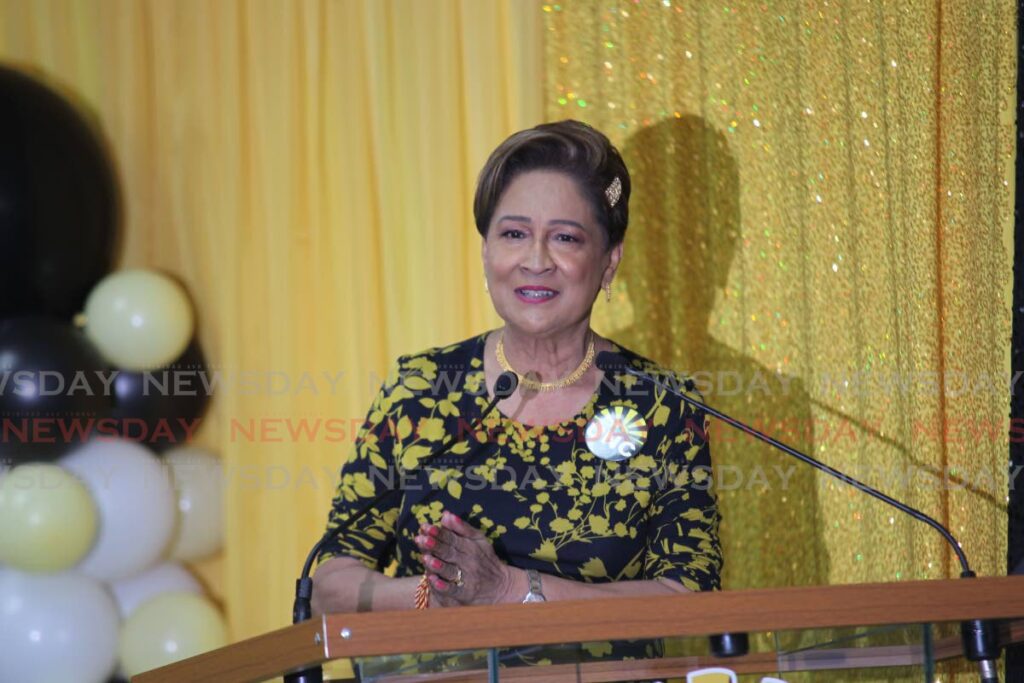 Opposition Leader Kamla Persad-Bissessar gives an address at the opening of the UNC's new headquarters in Chaguanas on Sunday. - Photo by  Lincoln Holder