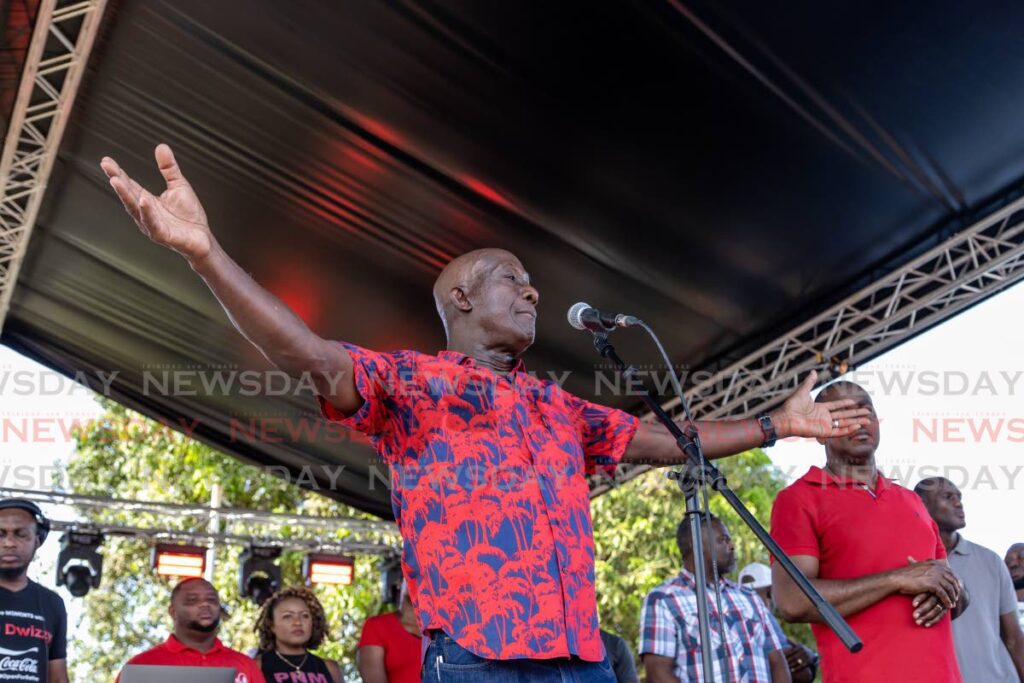 Prime Minister Dr Keith Rowley speaks at the PNM's family day in Toco on Sunday. PHOTO BY JEFF MAYERS - 