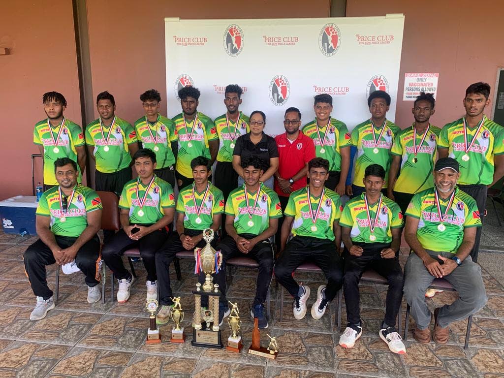 South Under-17 cricket team celebrate after winning the Price Club North-South Cricket Classic. In the middle are Rihanna Sony and Jason Abdool of Price Club Supermarket. - courtesy TT Cricket Board