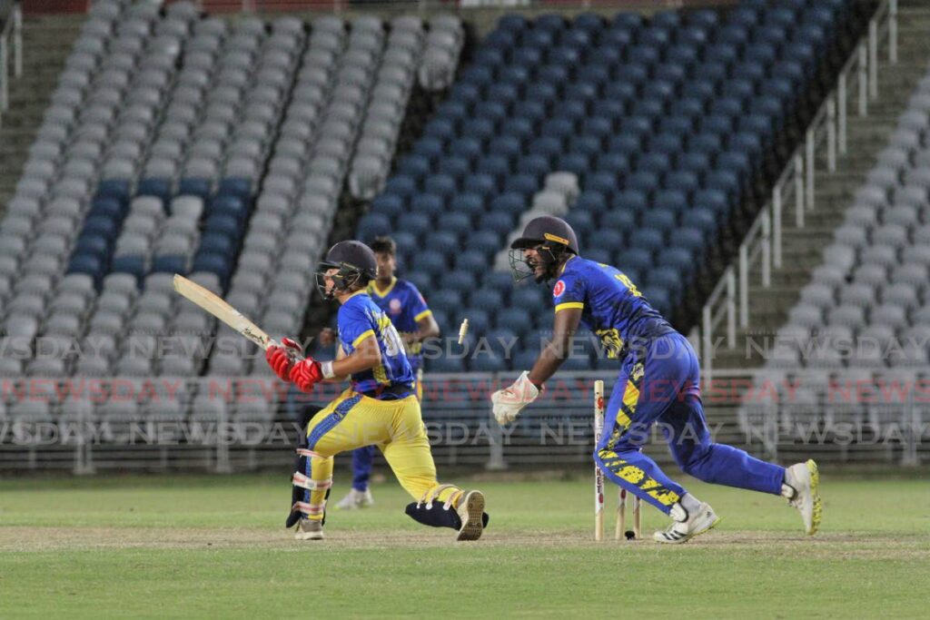 Presentation College San Fernando's wicketkeeper celebrates a dismissal against Fatima College, during the Powergen SSCL Intercol T20 final, on Wednesday night, at the Brian Lara Cricket Academy, Tarouba. - Marvin Hamilton