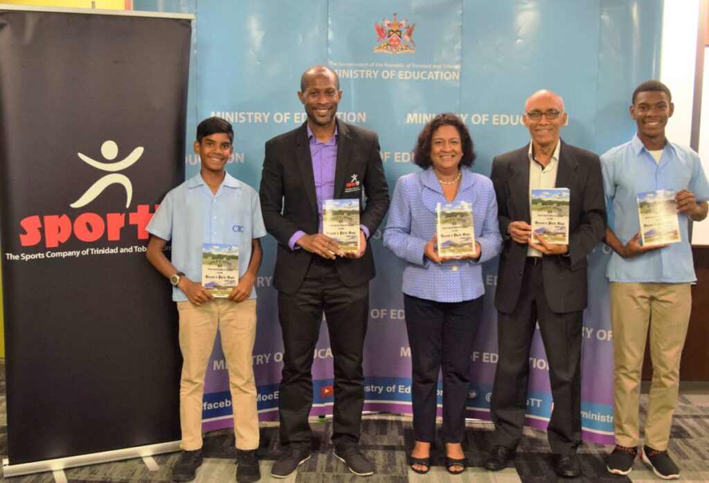 St Mary's College cricketer Ishmaeel Mohammed, from left, acting CEO of SporTT Kairon Serrette, acting CEO of the Department of Education Anna Singh, author Nasser Khan and St Mary's cricketer Khalfani Wiltshire at the book launch at the Department of Education, St Vincent, Port of Spain recently.  - Courtesy of Nasser Khan