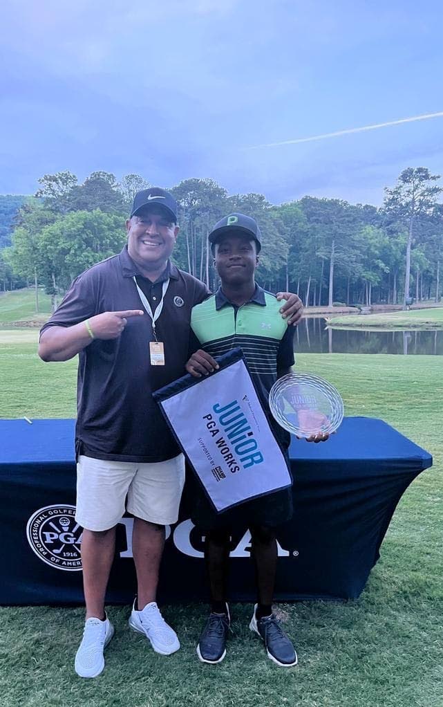 TT golfer Ethan Hill, right, celebrates winning the Junior PGA Works Championship boys' title in Alabama, US, over the weekend.  - Courtesy TTGA