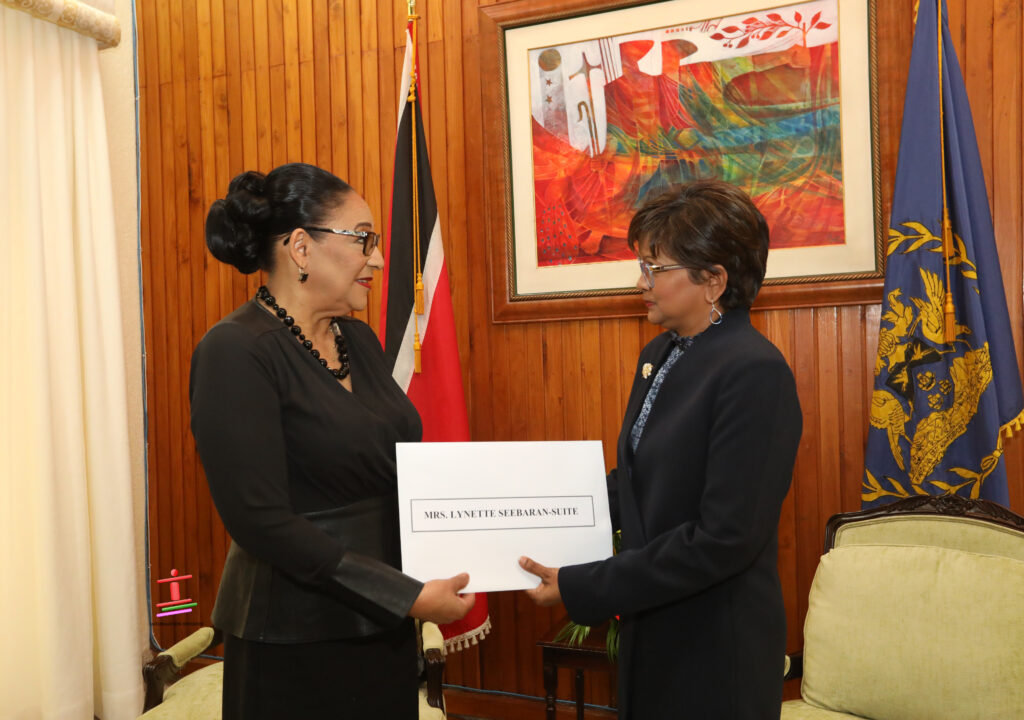 Law Association president Lynette Seebaran Suite receives her letter of appointment as Senior Counsel from President Christine Kangaloo. PHOTO COURTESY OFFICE OF THE PRESIDENT -