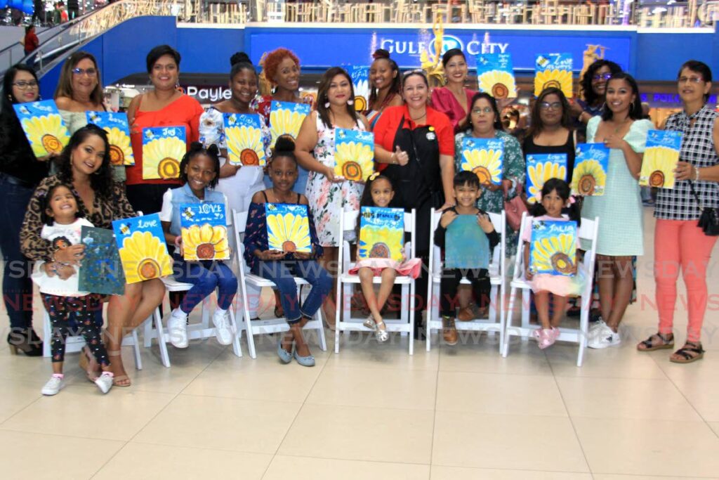 Mothers and daughters who took part in the Arty Party Mummy and Me Sip and Paint at Gulf City Mall, La Romaine.