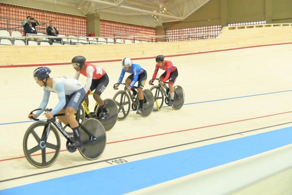 TT's Syndel Samaroo, second from left, looks to make a move during Sunday's Junior Pan Am Track Cycling Championships men's keirin event in Paraguay.  - Federacion Paraguaya de Ciclismo