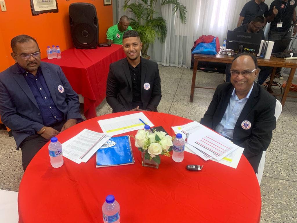 Experienced journalist Vinode Mamchan, left, cricketer player Mark Deyal and former West Indies manager Omar Khan at the Dream XI T10 Blast launch on Monday. - courtesy TT Cricket Board
