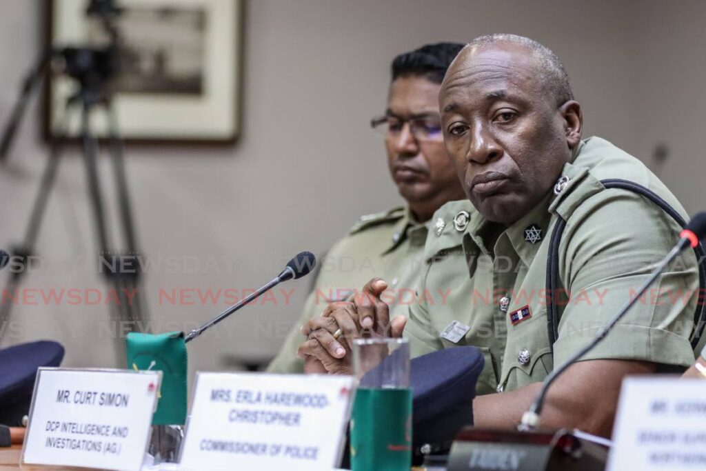 DCP Intelligence and Investigations (Ag.) Curt Simon, right, at the National Security JSC meeting at Cabildo Chambers, Port of Spain on Wednesday. PHOTO BY JEFF MAYERS - Jeff Mayers