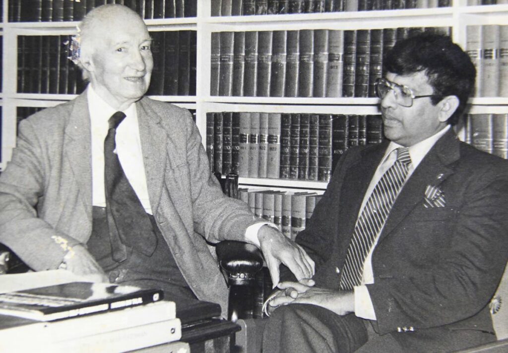 Prof Ramesh Deosaran discussing trial by jury with Privy Council Law Lord Denning at his home library outside London in 1982. - Photo courtesy Ramesh Deosaran
