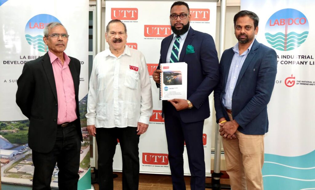 From left: UTT president Prof Prakash Persad, UTT chairman Prof Clement Imbert, Labidco chairman  Dr Joseph Khan and Labidco general manager Terrence Boodoosingh with a copy of the report. - Labidco