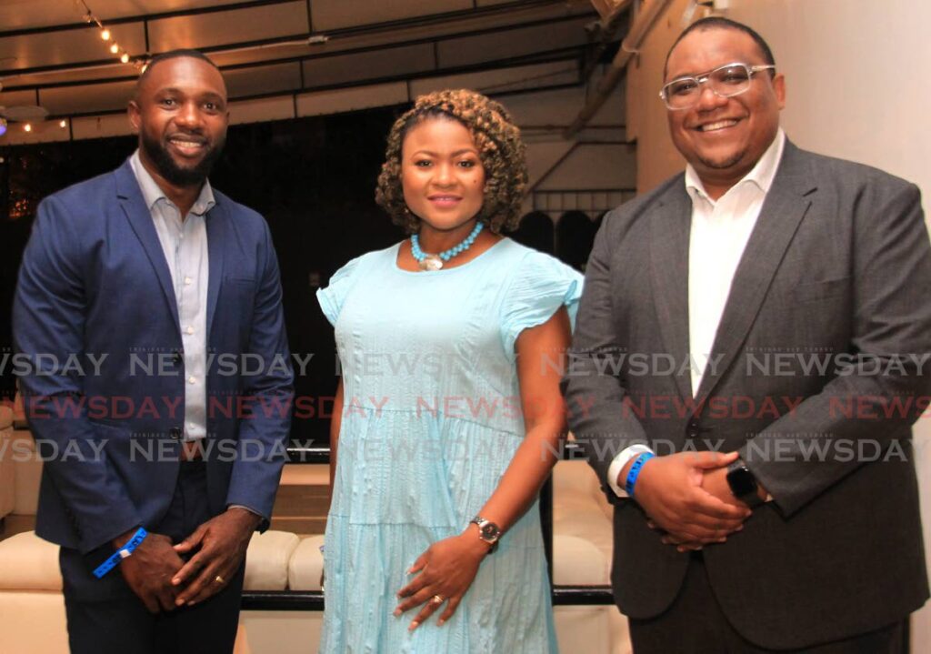 Minister of Education Dr Nyan Gadsby-Dolly, centre, THA Minority Leader Kelvin Morris, left, and president of the Heliconia Foundation for Young Professionals Kwasi Robinson during the foundation's inauguration at The Bungalow, Rust Street, Port of Spain on May 19.  - AYANNA KINSALE