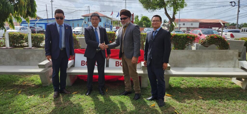 From left, Beijng Construction Engineering Group officials Ma Shulong, Gao Qiang, chairman of the Couva/Tabaquite/Talparo Regional Corporation Henry Awong, and project manager Leo Wang at the gift donation ceremony on May 17 in Couva. - 