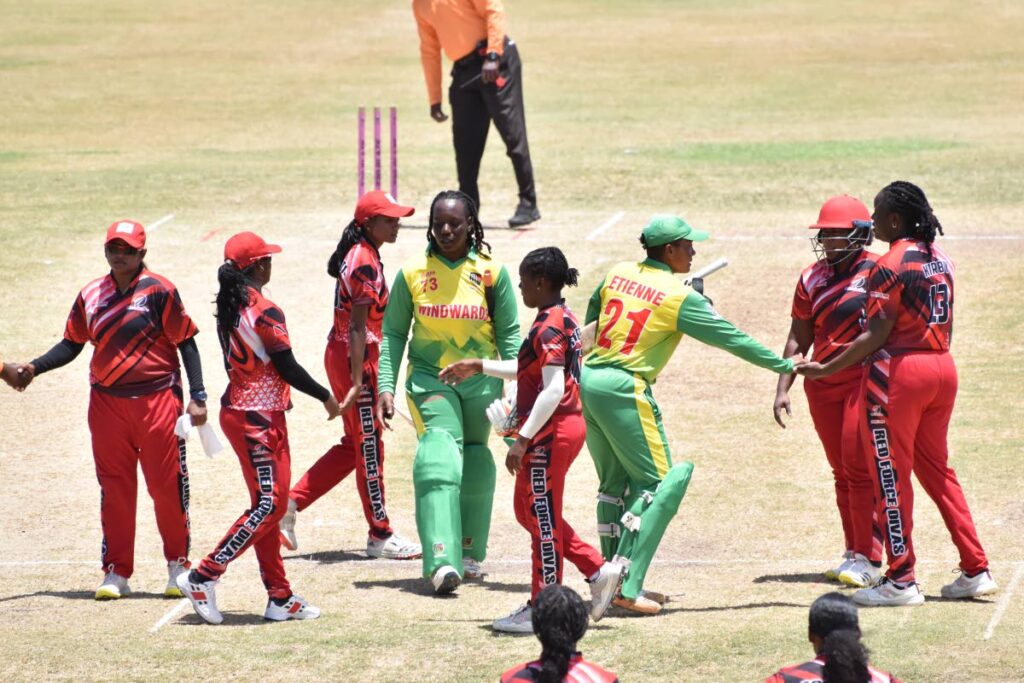 Red Force Divas players (in red) congratulate Windward Islands on Tuesday in the Cricket West Indies T20 Blaze in St Kitts - courtesy Cricket West Indies