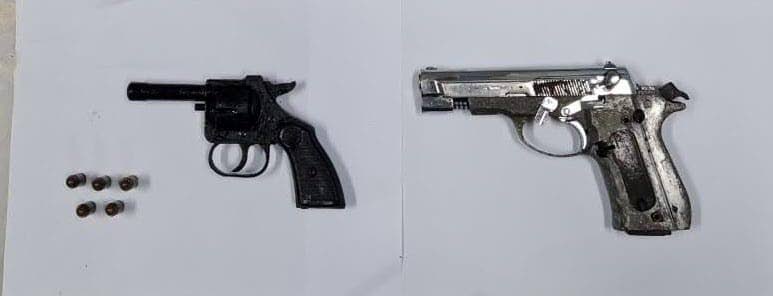 Police seized a black revolver with five rounds of ammunition in Maloney and an FN Herstal pistol in Arouca on Tuesday night. One man was held in relation to one of the guns. 

PHOTO COURTESY TTPS - 