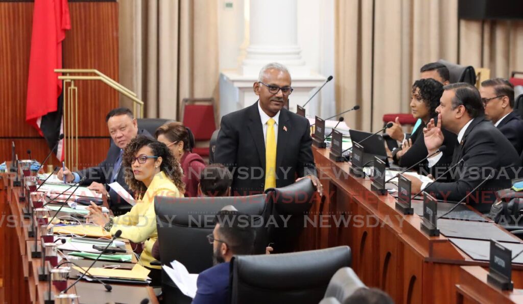 THROWN OUT: Couva South MP Rudranah Indarsingh leaves the chamber after being put out by the Deputy Speaker during debate on Wednesday in the House of Representatives. PHOTO BY ROGER JACOB - 